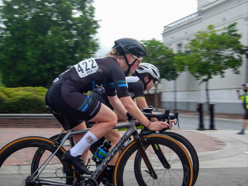 Female Tulane Cycling cyclist during a road race. 