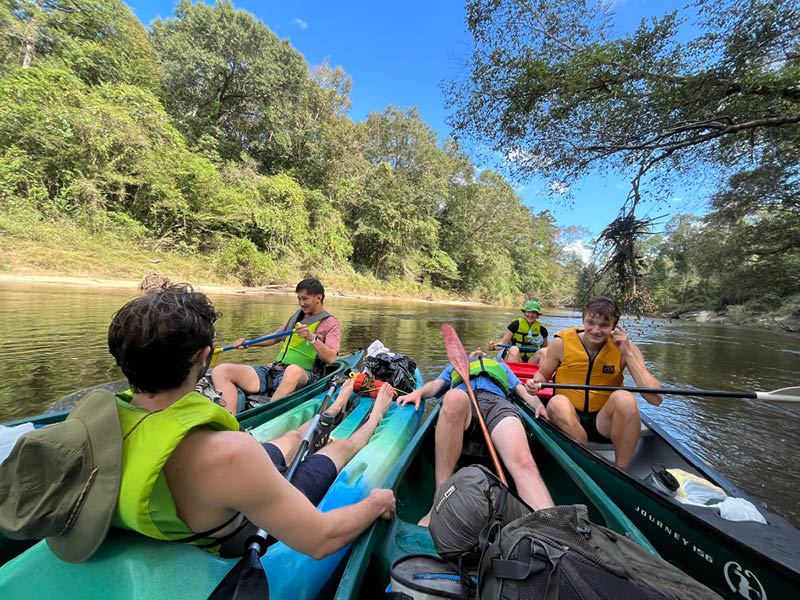 Group paddling the river.