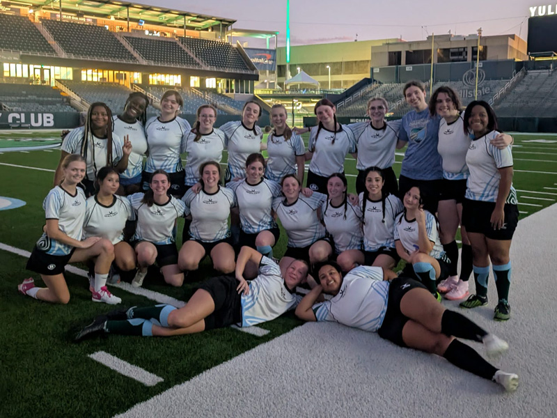 Club sports team poses in Yulman Stadium